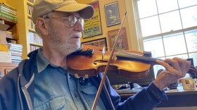 Musician John Harrod at his home in Owen County is demonstrating fiddling from various regions in Kentucky.
