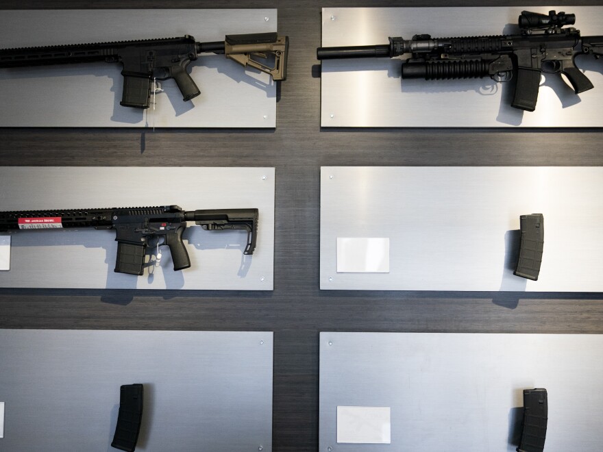 AR-15-style rifles are displayed at Rainier Arms Friday, April 14, 2023, in Auburn, Wash.