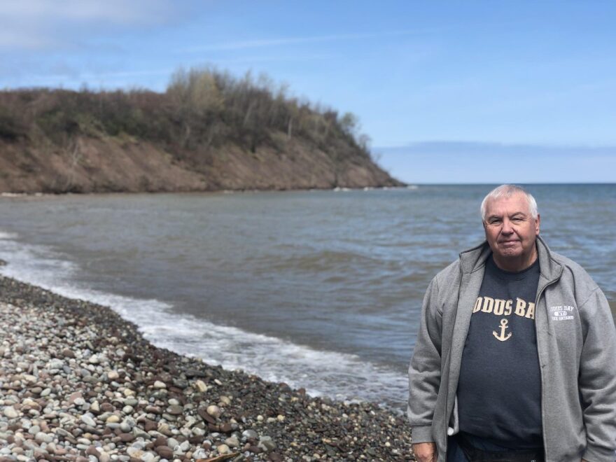 Bruce Farrington stands in front of Freedom Hill. CREDIT VERONICA VOLK / WXXI NEWS