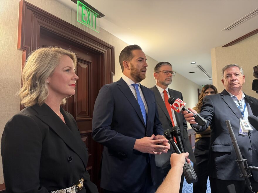 Rep. Jenna Persons-Mulika (left), House Speaker Daniel Perez (center), and Speaker Designate Sam Garrison address the press on April 28, 2026.
