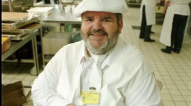 Chef Paul Prudhomme posed in the kitchen of a convention center in Jerusalem in 1996. He and 12 other chefs prepared a 12-course kosher feast as part of Jerusalem 3,000 celebrations.