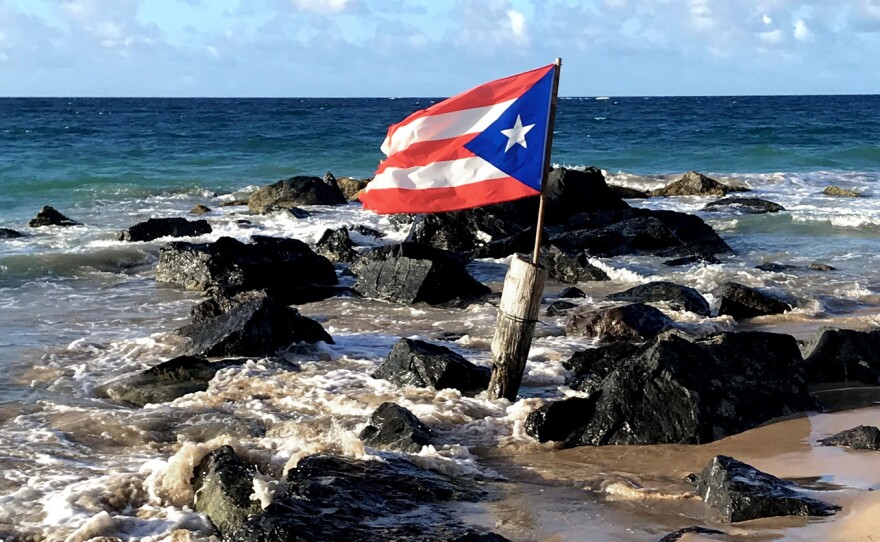 The Puerto Rico flag flies on the beach in Condado, a neighborhood of San Juan.
