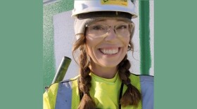Photo of Christina Harms a Union-Painter working on site.