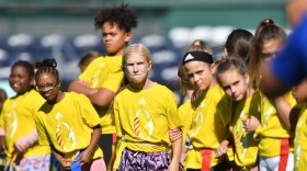 Young girls and even several boys enrolled in Jen Welter's Grrridiron Girls Football Camp at Legends Field in Kansas City, Kansas, on Oct. 17.