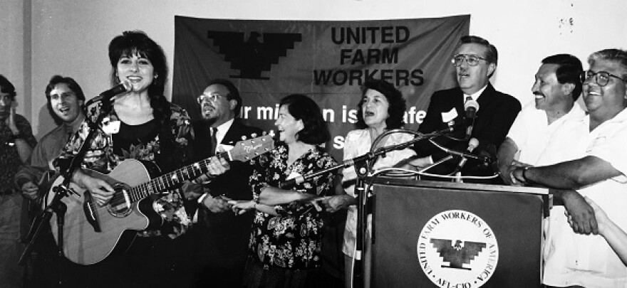 Musician Tish Hinojosa supporting the United Farm Workers' grape strike. Her decades-long career in music features an array of social justice themes.