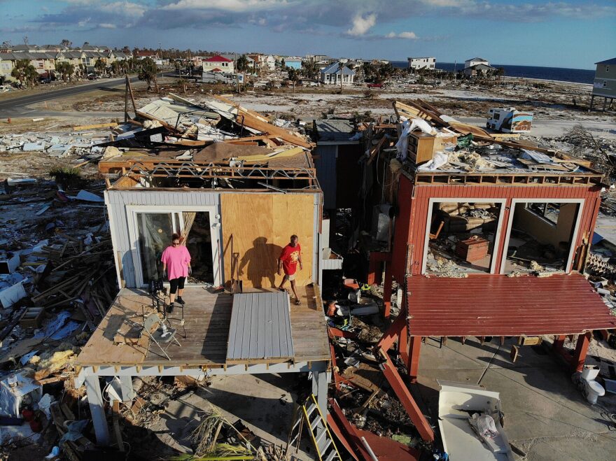 Bela and Jaques Sebastiao begin the process of cleaning up their home after it was heavily damaged by Hurricane Michael, on October 17, 2018 in Mexico Beach.