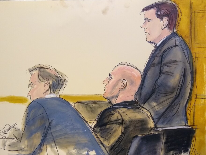 In this courtroom artist's sketch, defense attorney William Harrington (from left), defendant David Correia and defense attorney Jeff Marcus appear in U.S. District Court for the Southern District of New York on Wednesday.