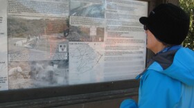 Henrietta Stern of FORT Friends looks at a map of the BLM public lands.