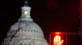 The U.S. Capitol is seen above in 2009 as senators worked late into the night on legislation. The light signifying that Congress is in session may remain on this holiday season as well, since House Republicans have said they will remain in a pro-forma session. 