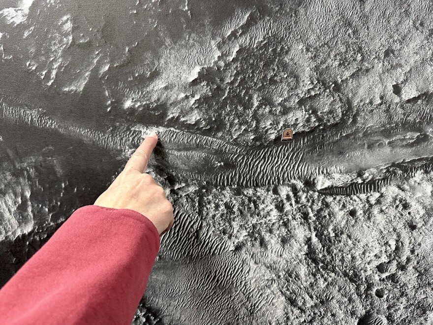 USGS scientist Alicia Vaughan points out the Bright Angel Region on the surface of Mars.