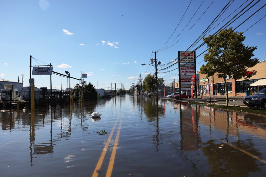 Floodwater covers a street on Thursday in Newark, N.J. Gov. Phil Murphy declared a state of emergency due to Tropical Storm Ida, which caused flooding and power outages throughout New Jersey as the Northeast was hit by tornadoes and record rain.