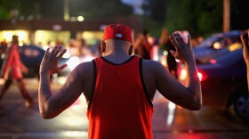 Demonstrators gather along West Florissant Avenue to protest the shooting of Michael Brown on Aug. 15, 2014 in Ferguson, Missouri. (Scott Olson/Getty Images)