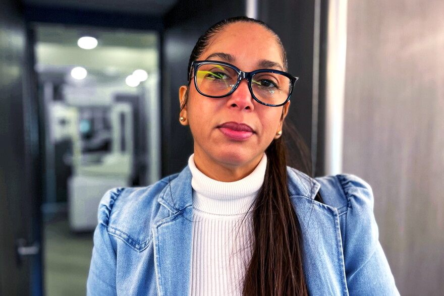 Odalis Rivera stands inside Hartford Hospital's mobile mammography unit, parked in the Frog Hollow neighborhood of Hartford on October 22, 2026. “The care I received was wonderful,” Rivera said in Spanish about her experience in the van.