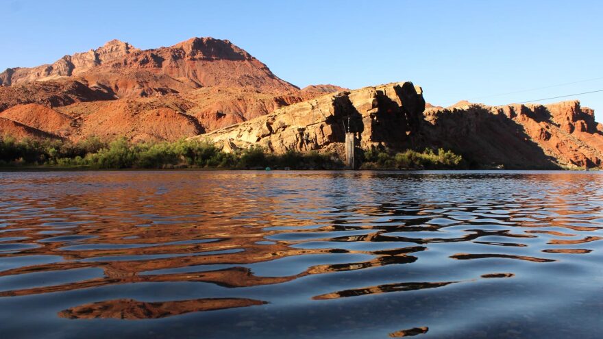 The Colorado River flows past Lees Ferry in Coconino County, Arizona on June 17, 2026. A new plan for managing the shrinking water supply will cut back on the amount that flows to Arizona, California and Nevada.
