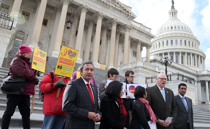 Members of Congress, including Rep. Joseph Crowley (second from right), participate in a vigil coordinated and sponsored by SAALT to honor and bring national attention to the victims of hate violence in South Asian, Sikh, Muslim and Arab-American communities across the country.