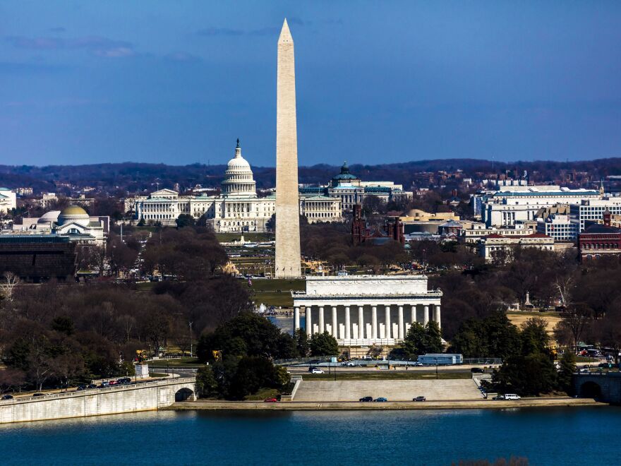 Aerial view of Washington D.C., showing the Lincoln Memorial and Washington Monument as well as the U.S. Capitol.