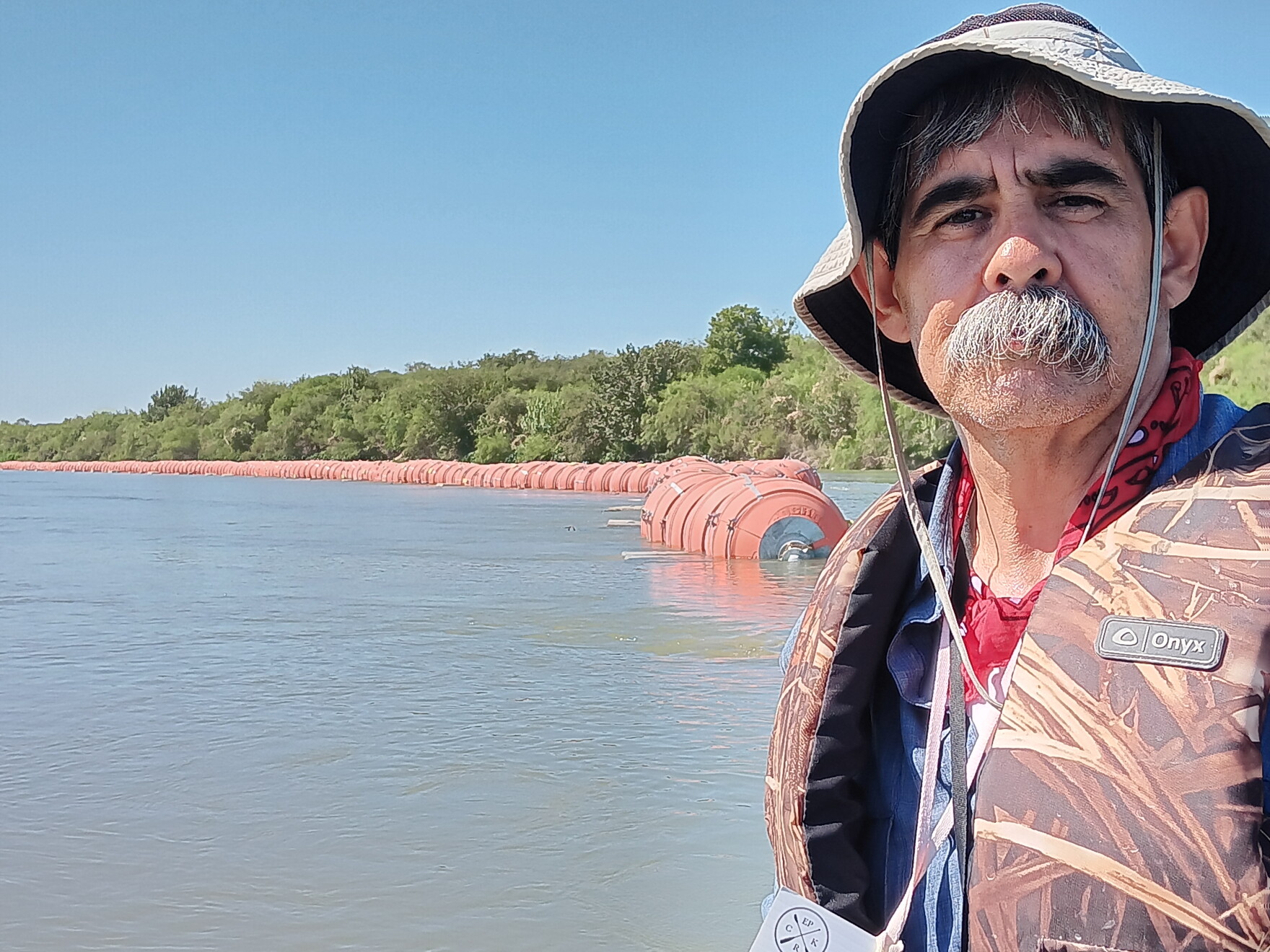 Up-close look at Gov. Greg Abbott’s floating wall in the Rio Grande | TPR