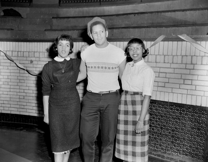 WEB Boy posing with 2 girls at school dance.jpg