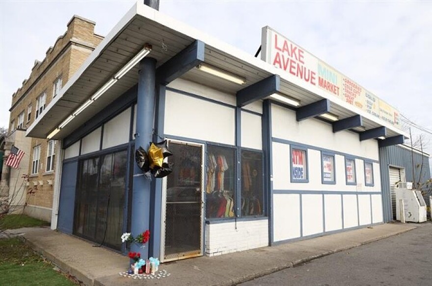 A makeshift memorial sprung up at the Lake Avenue Mini Market a day after its clerk, Anthony (Tony) Lovett, was stabbed and killed inside on Nov. 29, 2021.