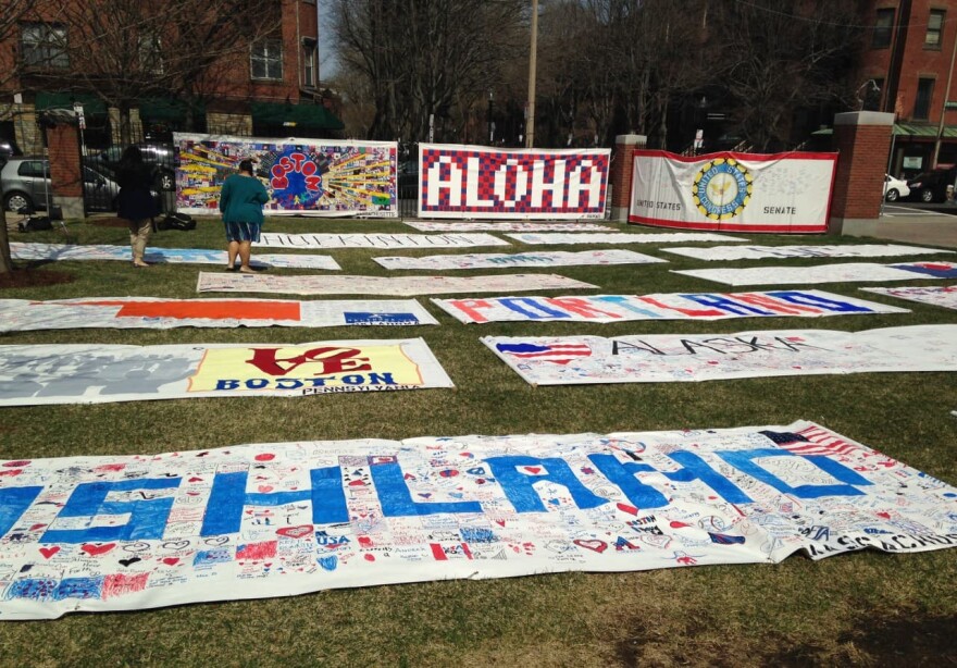 These banners pictured at Boston Medical Center, a year after the Boston Marathon bombing, traveled to 50 states and were signed by more than 50,000 people. (Ron Medzon)