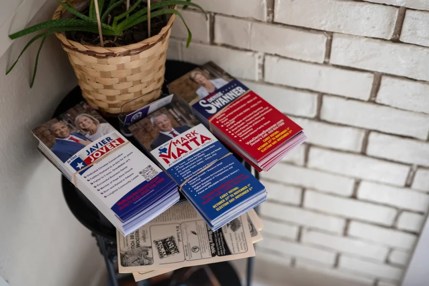 Campaign flyers for Mayor Javier Joven and City Council members Mark Matt and Denise Swanner sit on a side table inside Casa Ortiz, a local Mexican restaurant in Odessa. One Odessa family spent more than $200,000 supporting the incumbent council candidates, hiring campaign staff that did not live in Odessa and supporting messaging attacking Stoker’s sexual orientation and religious beliefs.