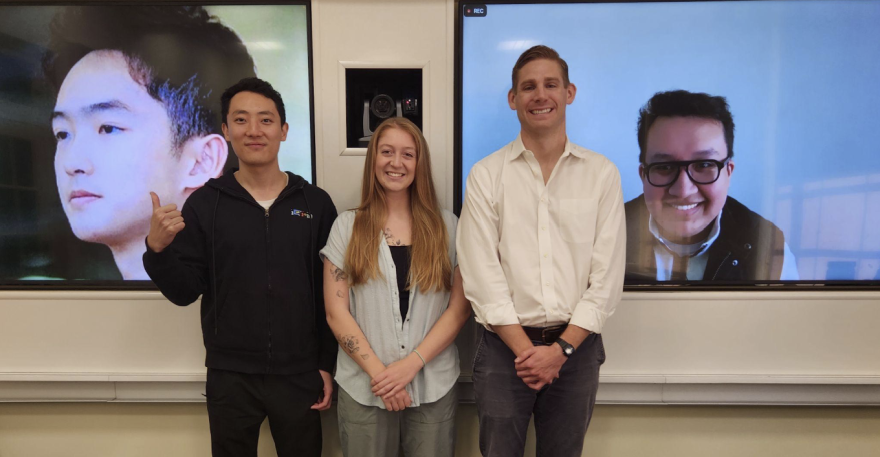 Students from the Fall 2023 edition of the Lean Innovation Lab (L - R) Steven Shou, Fan Chen, Tyler Faris, Will Wilkinson present their findings alongside Air National Guard sponsor Annalise O’Lear (center).