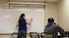Anne Fisher leads a remedial math study session at Tulsa Community College as students prepare for a final exam last December. TCC is among several universities and colleges in Oklahoma revamping remedial courses in math and English.