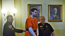 Seth Wakefield is escorted into an Oneida County Courtroom for his preliminary hearing Monday morning.