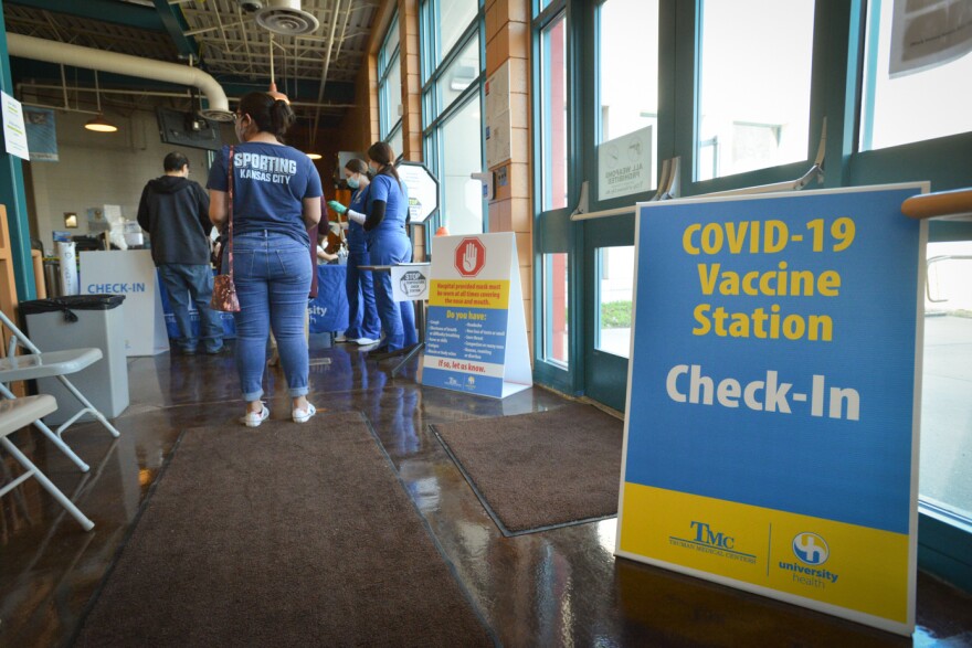 Residents of Kansas City's west side line up to receive their second dones of the Moderna vaccine on Monday, March 8, 2021 at the Tony Aguirre Community Center.2