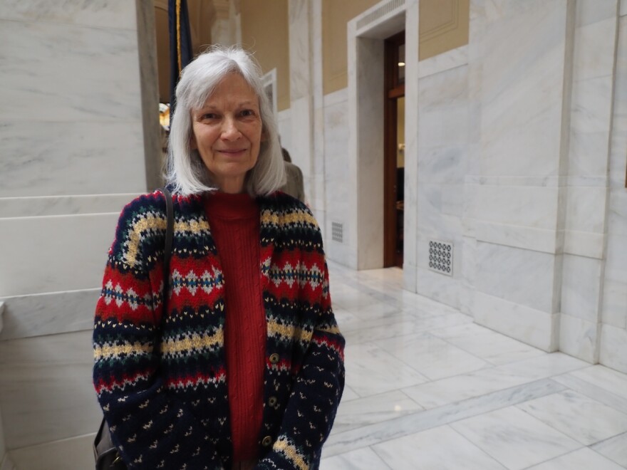 Marti Olesen, vice president of the Buffalo River Watershed Alliance, stands outside the Senate agriculture committee room in the Arkansas Capitol on Feb. 4, 2025. Olesen traveled during the pre-dawn hours from Ponca to ensure she was present for the discussion of a bill regarding a ban on permit moratoriums on state watersheds, including along the Buffalo River.