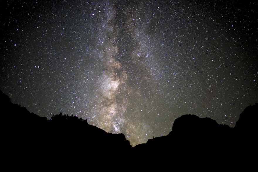 Illuminated Milky Way in a starry night sky.