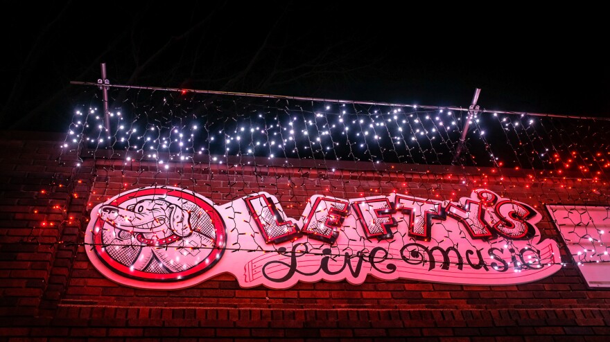 Lefty's Live Music's sign decorated with lights. The venue will close at the end of the year.
