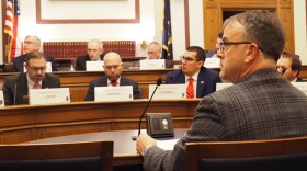 Terry Spradlin, the executive director of the Indiana School Boards Association, listens to a Ways and Means committee member on Feb. 6, 2025.