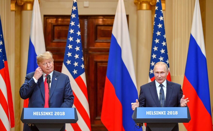 Presidents Trump and Vladimir Putin hold a joint news conference after a meeting at the Presidential Palace in Helsinki on Monday.
