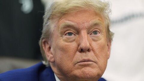 President Donald Trump talks with reporters as he meets with members of the Juventus soccer club in the Oval Office of the White House, Wednesday, June 18, 2025, in Washington. (AP Photo/Alex Brandon)