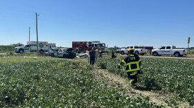 Emergency personel respond to a two-vehicle crash southeast of Columbus Tuesday afternoon.