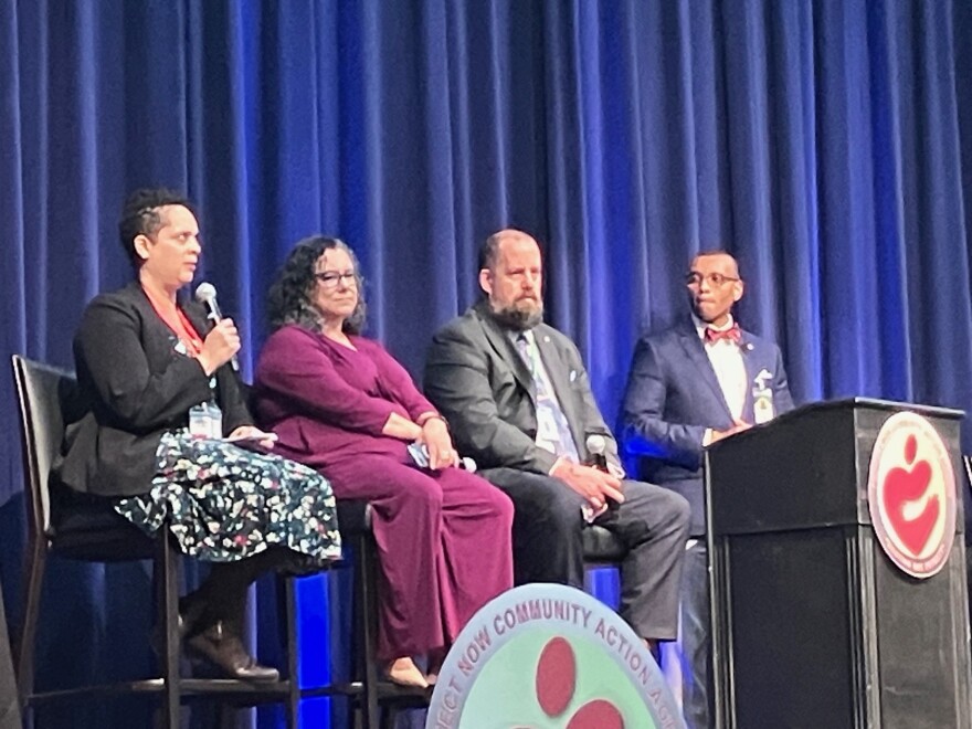 Christine Haley speaks at the panel discussion of homelessness April 9, 2026 at Waterfront Convention Center, Bettendorf.