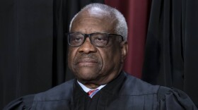Associate Justice Clarence Thomas poses for a new group portrait at the Supreme Court building in Washington. (J. Scott Applewhite/AP)