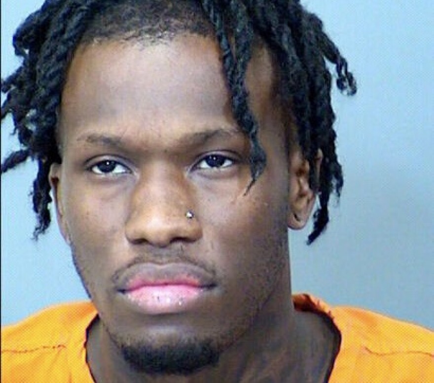 In this undated photo released by the Maricopa County Jail shows Essa Kolareh Eugene Williams, a suspect accused of shooting and seriously wounding a Phoenix police officer on Tuesday, Dec. 14, 2021. Williams had served prison time for armed robbery and continued shooting at the officer after he was already on the ground at an apartment complex parking lot, a prosecutor said.