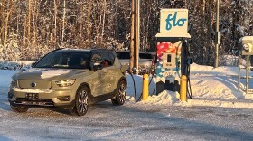 Kirby Hobley charges up his electric Volvo in the Golden Valley Electric Association parking lot in Fairbanks on Feb. 12, 2024.