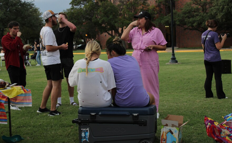 Group of students eating.