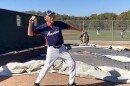 Tony Esposito of Naples warms up for his Roy Hobbs World Series game at JetBlue Park in Lee County. He's the oldest player ever in the Hobbs events in Southwest Florida.