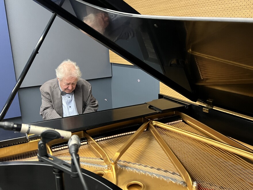 Mikhail Voskresensky at the piano.