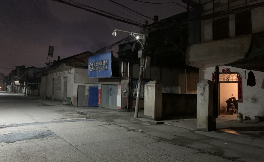 Streets were empty at 8 p.m. on Monday in a village in Jiangxi province even before an unofficial quarantine. Many families were at home having dinner, and the weather was freezing.