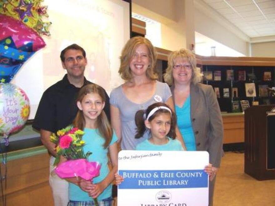 Al, Anna, Stacey, and Mary Grace Jafarjian with Library Director Mary Jean Jakubowski