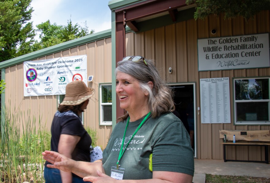 Executive Director Inger Giuffrida greets guests at WildCare Oklahoma's 2025 baby shower.