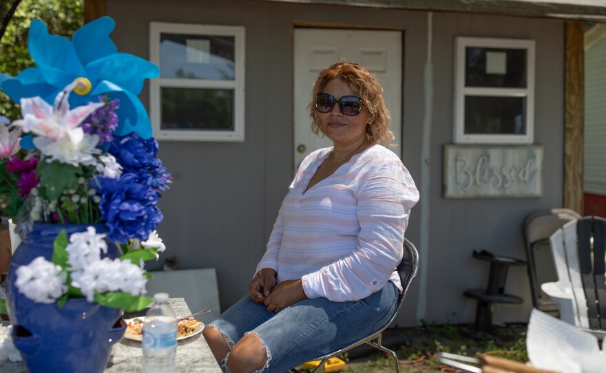Edilberto Espinoza Sierra's mother Elizabeth Sierra sits outside their family home in Wallace on April 17, 2026. Espinoza Sierra was shot and killed by the Wilmington Police Department in the early morning hours of March 8 following an incident in a downtown Wilmington parking garage. Espinoza Sierra was incorrectly identified as a suspect before he was killed and now his family is seeking answer and accountability.