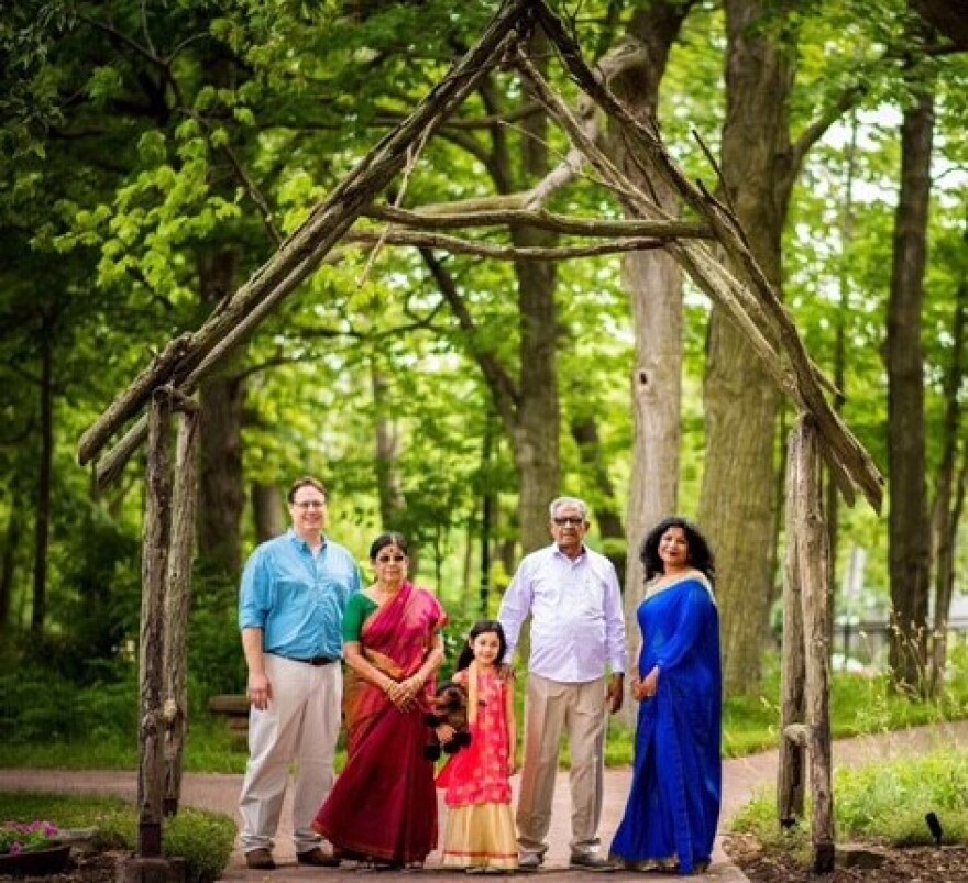 Punitha McCormick with her parents, husband, and daughter.