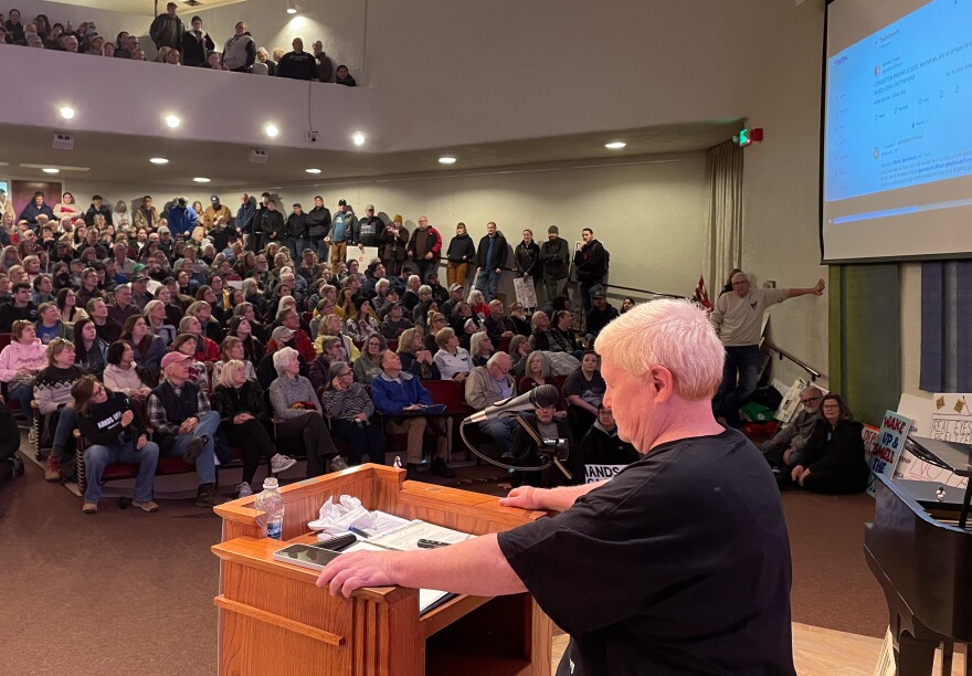Beverly Harvey, founder of Indivisible Kansas City, addressed demonstrators taking part in the nationwide "Hands Off!" protest. Prior to the rally at the Country Club Plaza, Harvey and other speakers provided information on additional ways to take action.