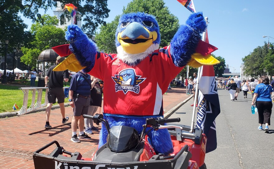 The Springfield Thunderbirds mascot celebrates during the Springfield, Massachusetts,  Pride parade.